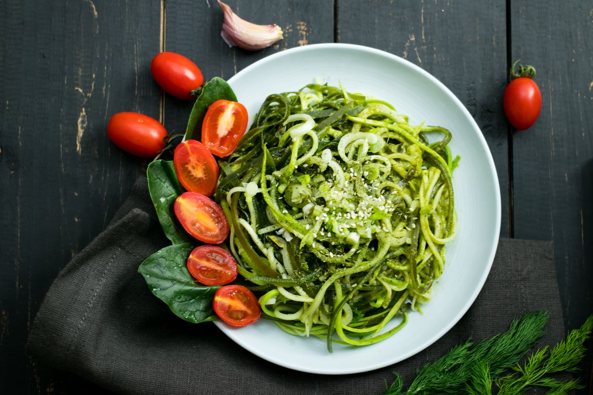 Seared courgette spaghetti and cherry tomatoes