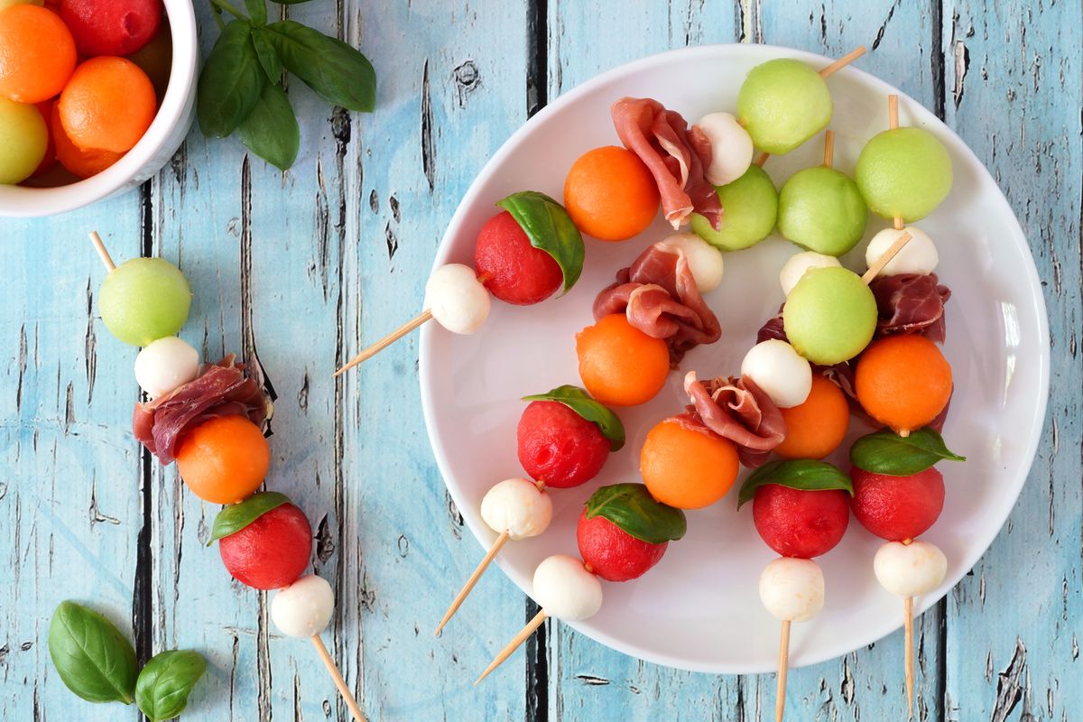 Skewers with summer fruit and cheese