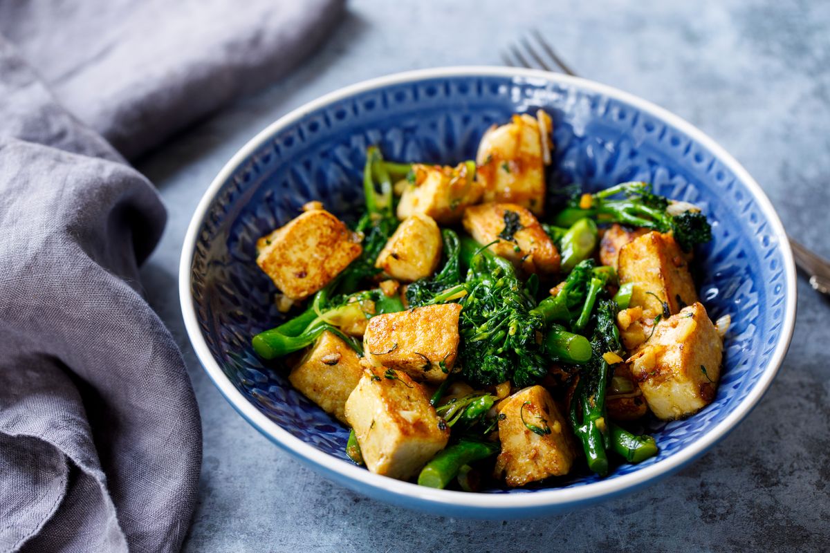 Tofu and broccoli in a pan