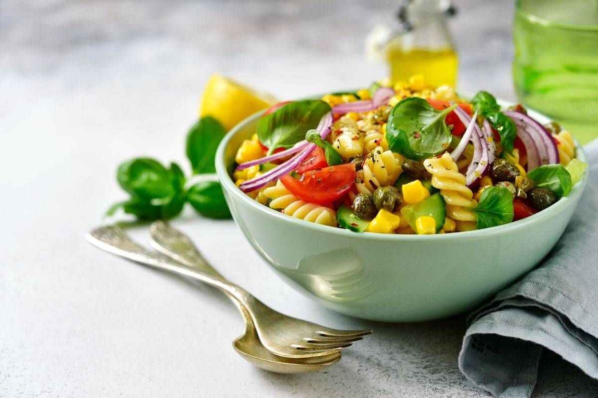 cold pasta with cherry tomatoes and corn