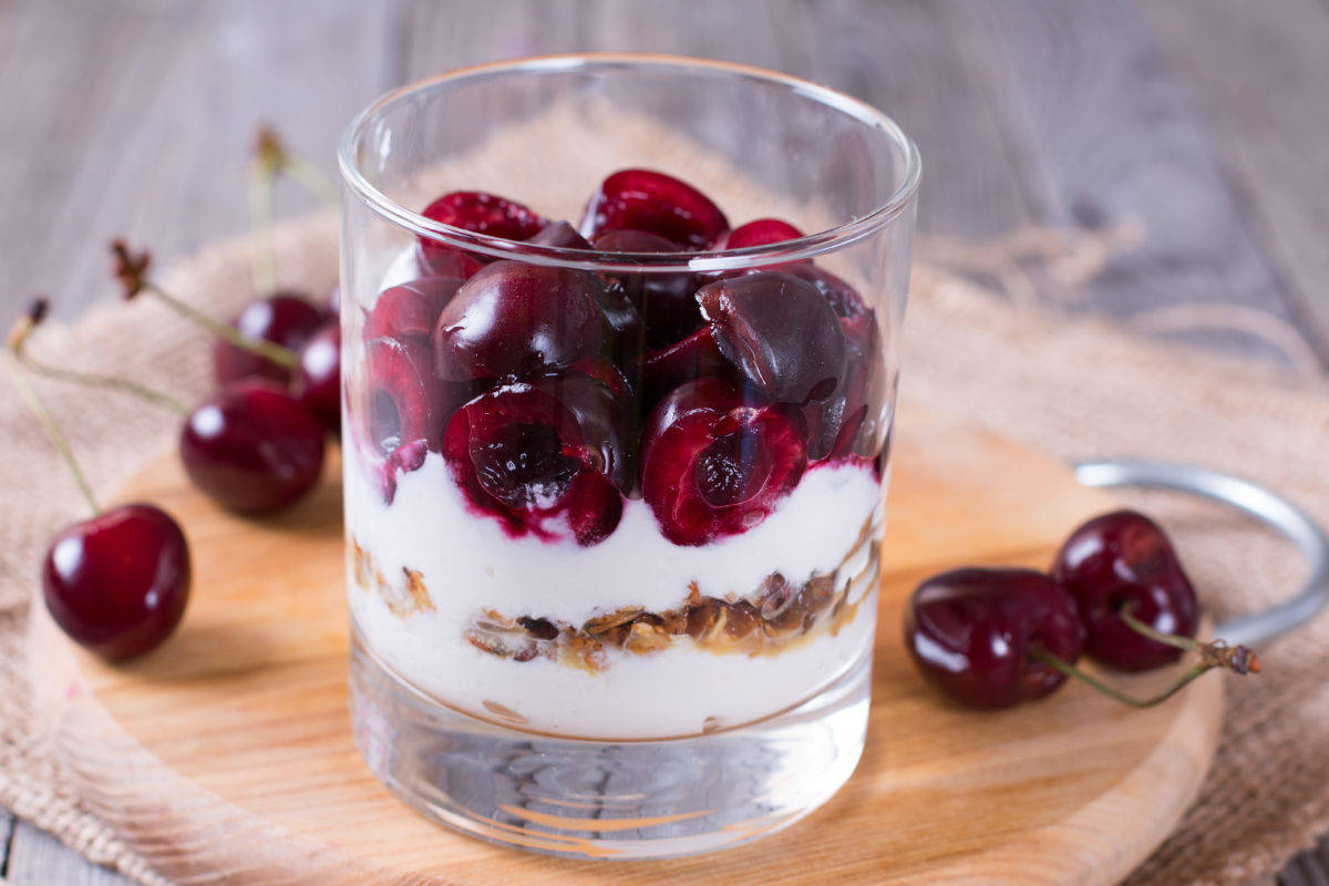 Cups of mascarpone and cherries