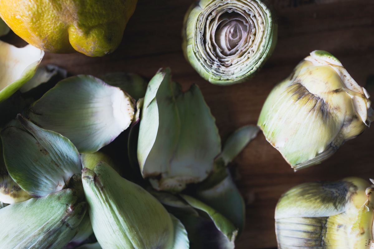 Clean the artichokes