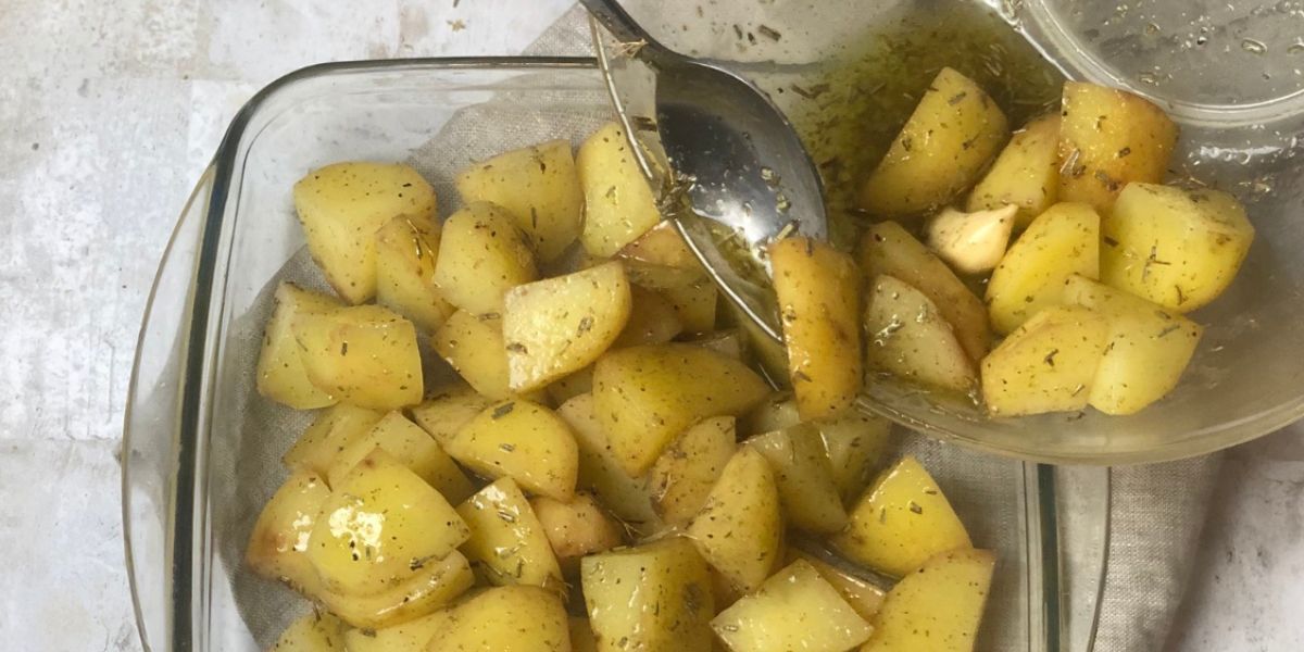 Transfer potatoes to baking sheet