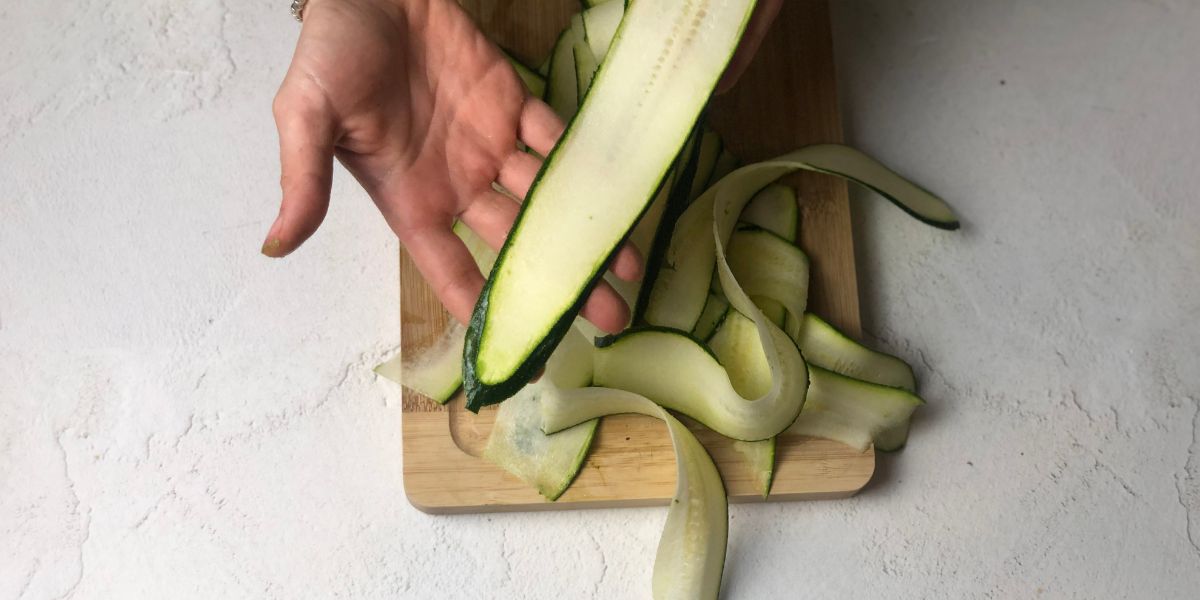 Cut zucchini into thin strips