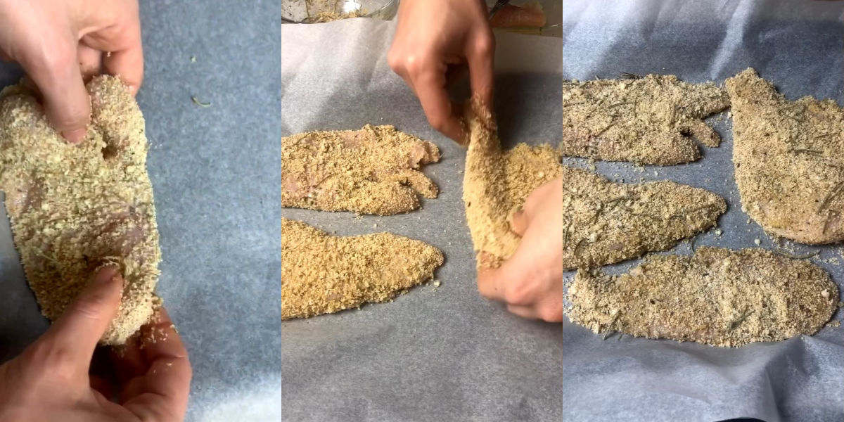 Disporre pollo impanato in teglia ricoperta con carta forno