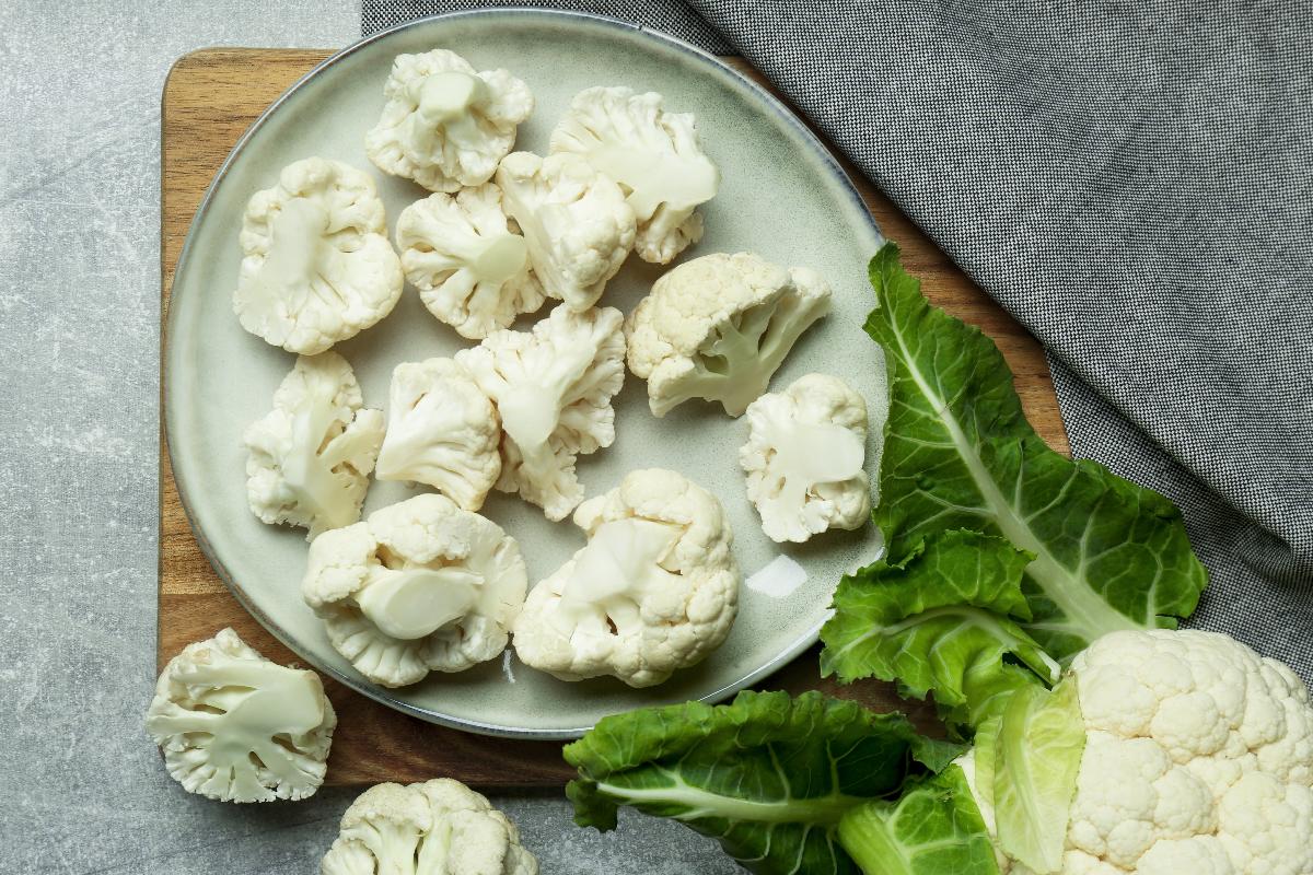 Cauliflower cut into small pieces on a plate