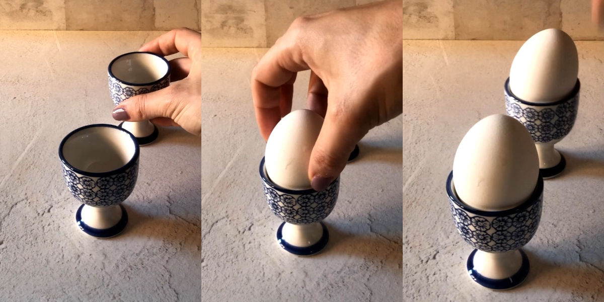 Mettere uova alla coque in un portauovo