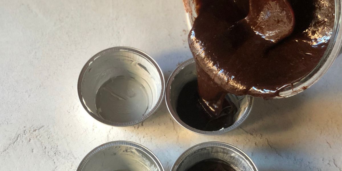 Pour the mixture into the baking cups