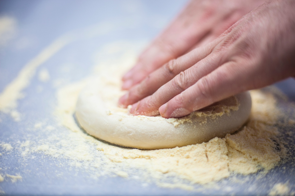 Roll out pizza dough