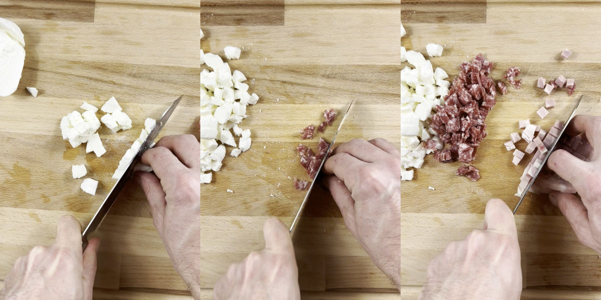 Cut mozzarella and salami into cubes