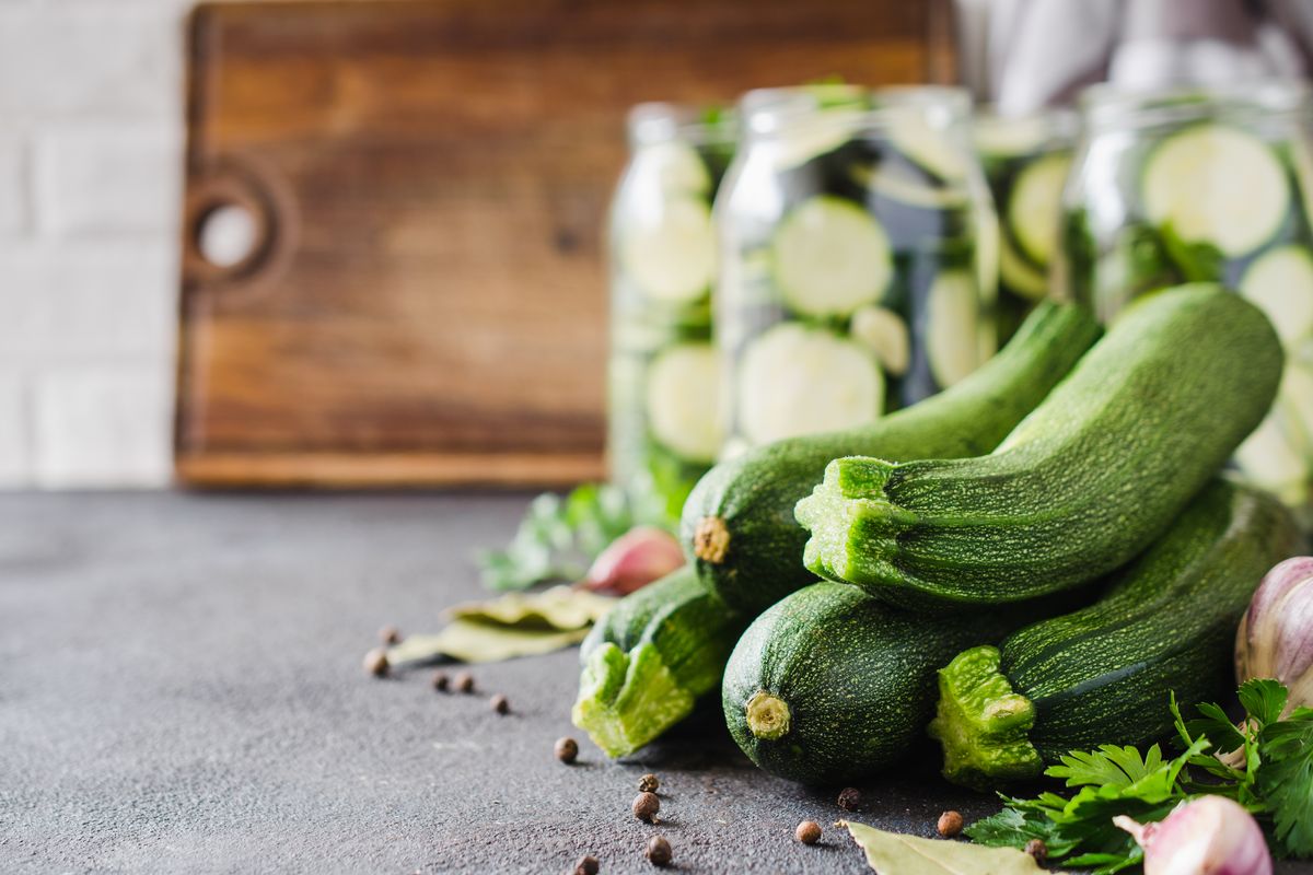 Courgettes and herbs for pickling preparation