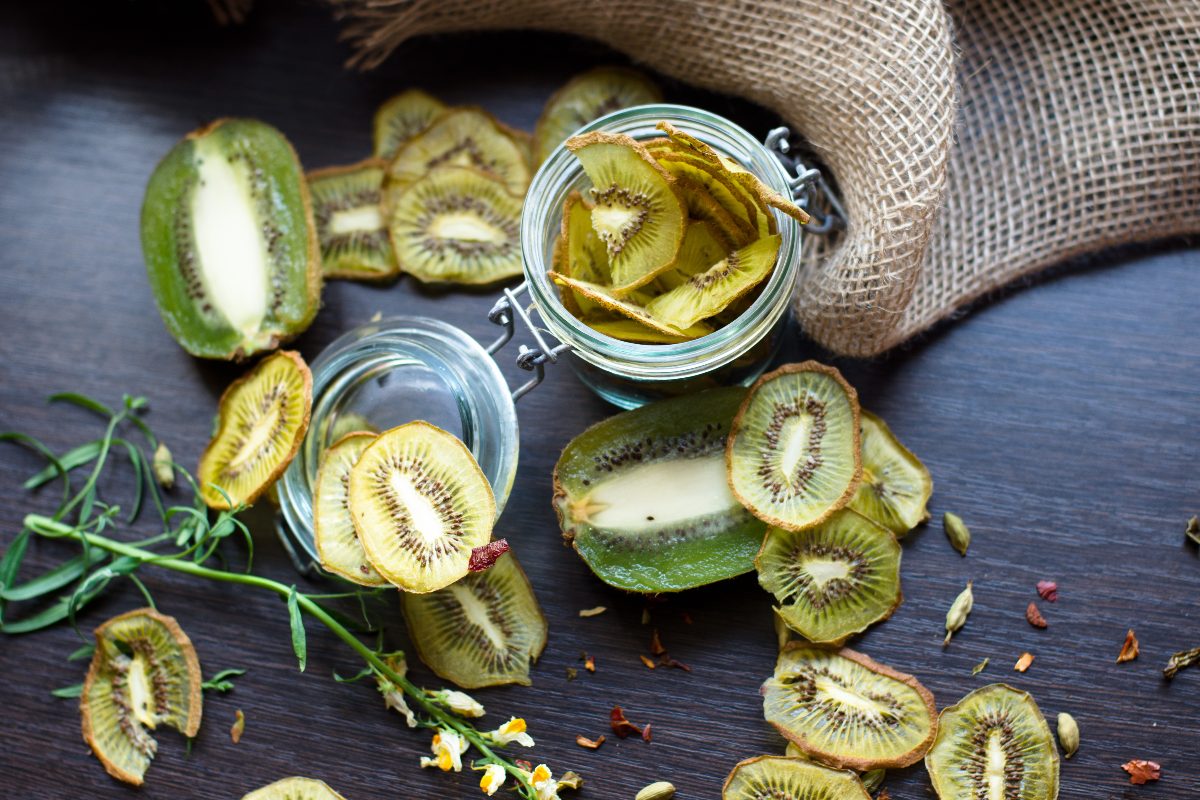 Jar with dried kiwis seen from above