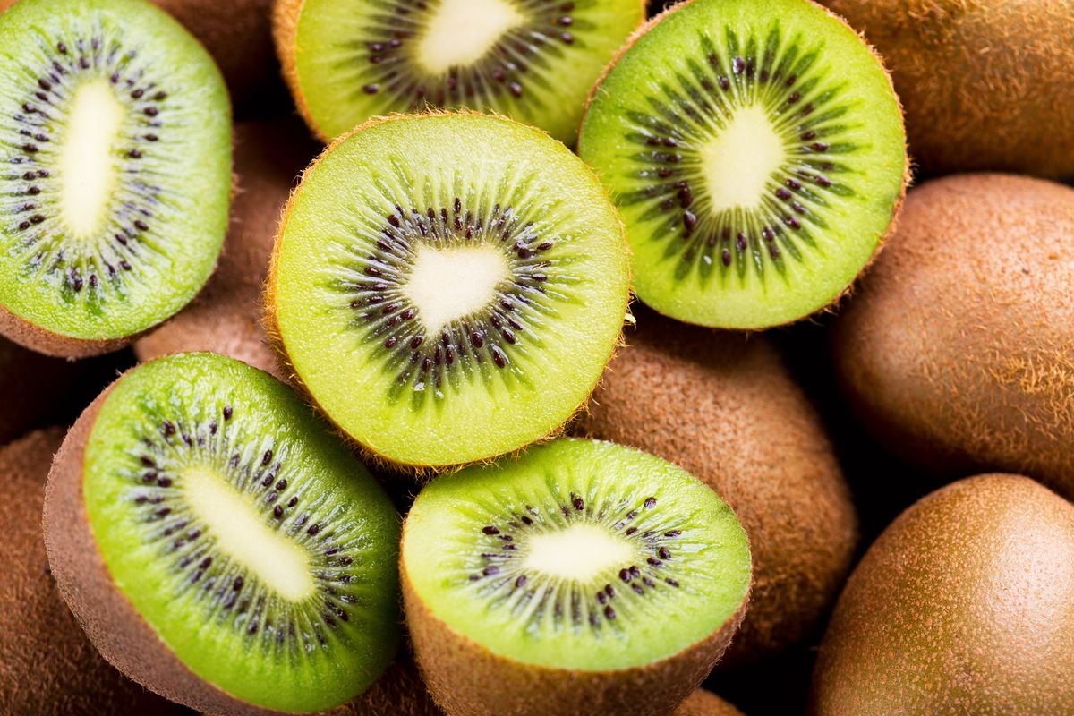 Kiwi fruit cut and whole